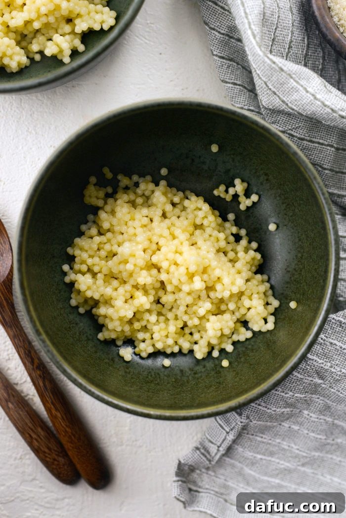 add cooked pasta to bowls