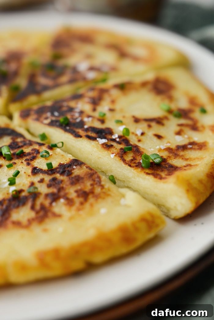 Irish Potato Griddle Cakes 21 Various traditional breakfast items including fried eggs, bacon, and sausages, often served with Irish Potato Farls.