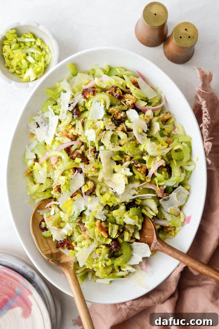 Celery, Date & Parmesan Delight 14 Serving a portion of Celery Salad with Dates and Parmesan
