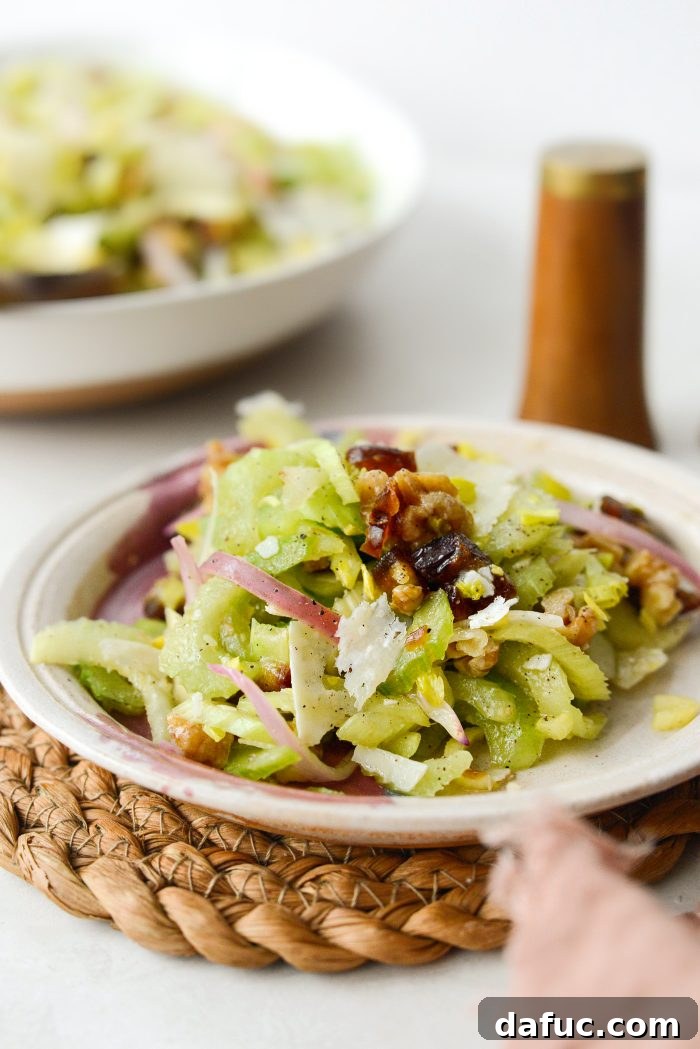 Celery, Date & Parmesan Delight 18 Celery Salad in a rustic bowl, highlighting its fresh ingredients
