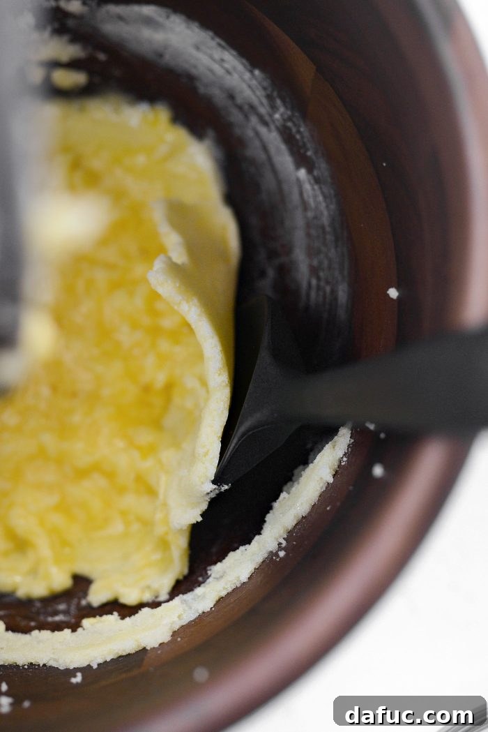 Scraping down the stand mixer bowl
