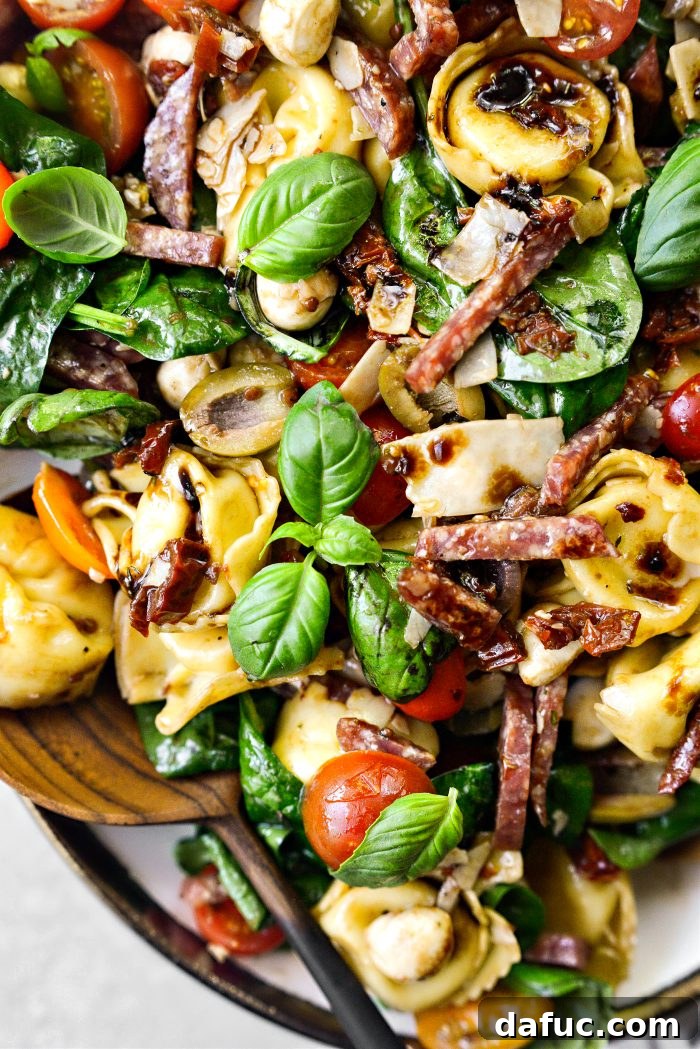 Rustic Tuscan Tortellini Salad 17 Beautifully presented Tuscan Tortellini Pasta Salad in a large bowl