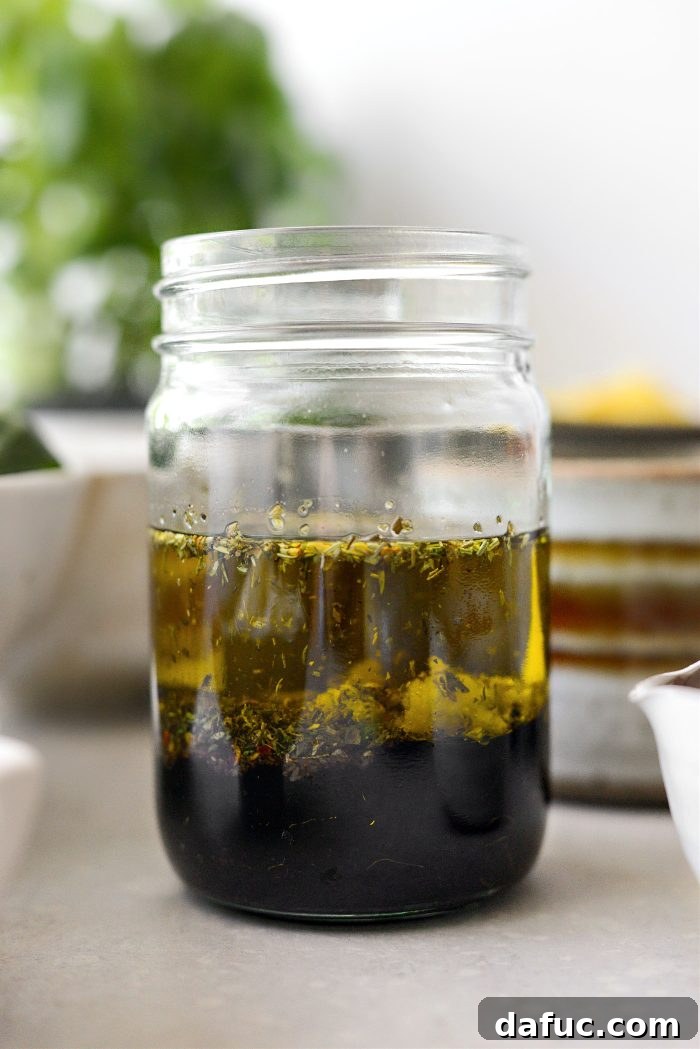 Rustic Tuscan Tortellini Salad 5 Ingredients for balsamic dressing in a glass jar
