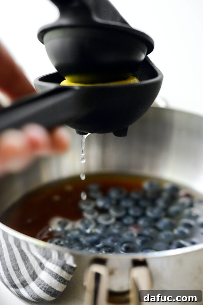 Squeezing lemon juice into saucepan