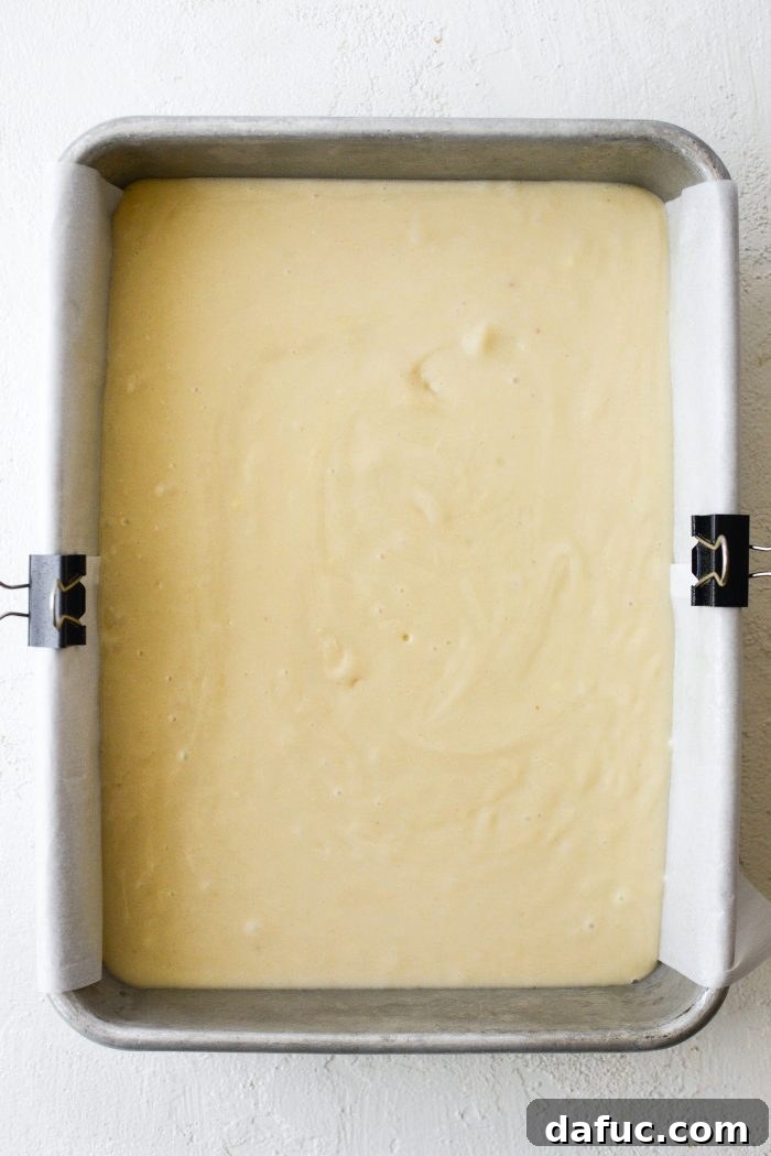 Cake baking on the middle rack of the oven until golden.