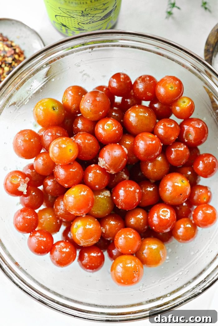 Sweet Blistered Tomatoes, Creamy Burrata, Crispy Pancetta 12 Tossing cherry tomatoes to evenly coat them with seasonings.