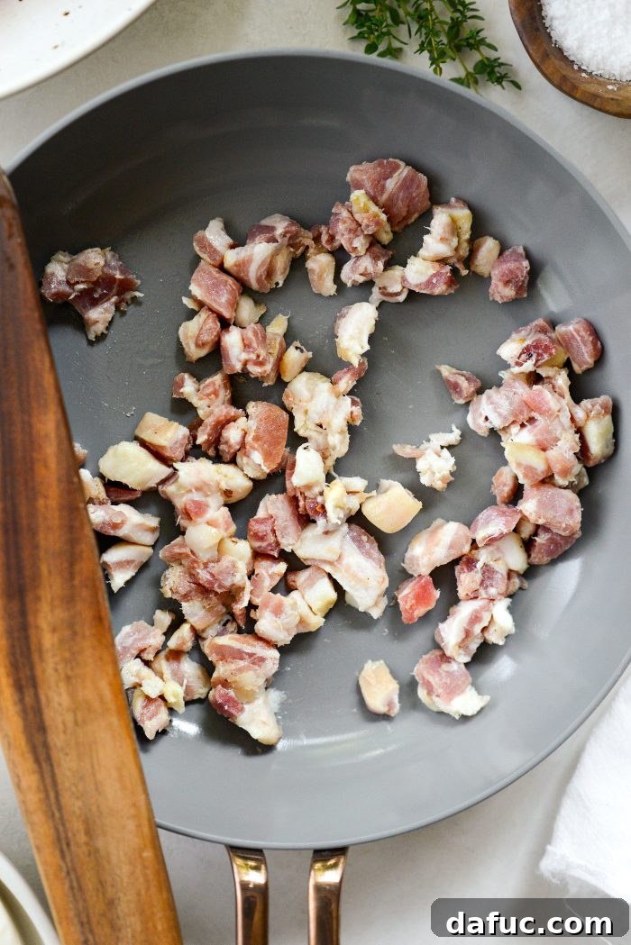 Sweet Blistered Tomatoes, Creamy Burrata, Crispy Pancetta 8 Adding diced pancetta to a small skillet for cooking.