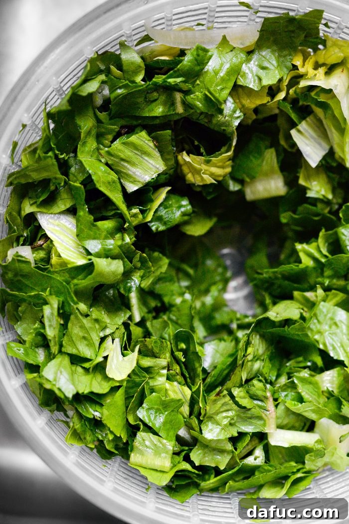 Ultimate Burger Bowl Creations 11 Spin-drying romaine lettuce