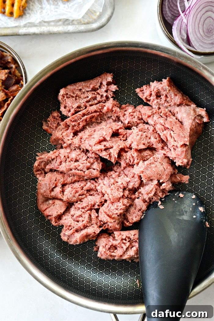 Ultimate Burger Bowl Creations 8 Ground beef cooking in a skillet