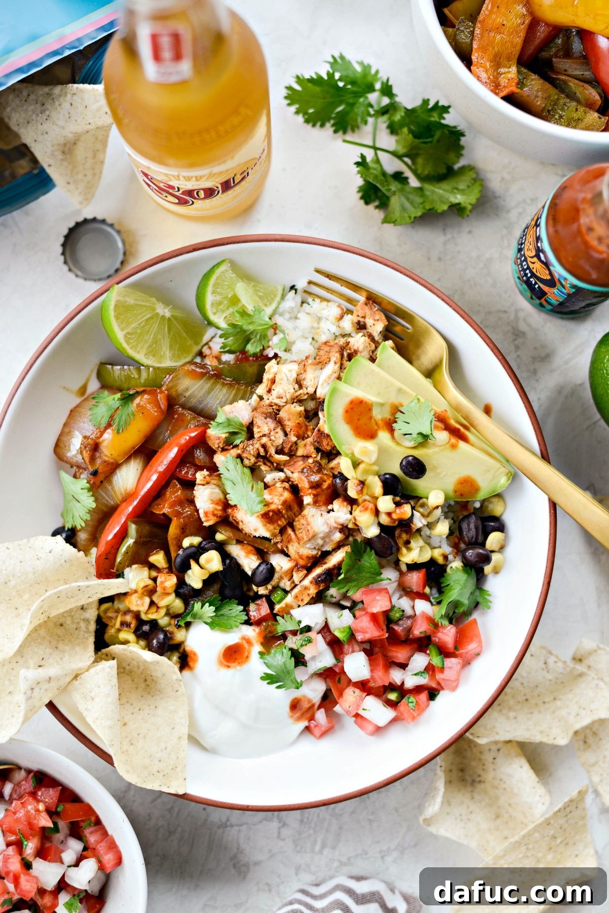 Smoky Chipotle Chicken Fajita Bowl 2 Chipotle Chicken Fajita Rice Bowls with fresh ingredients and toppings