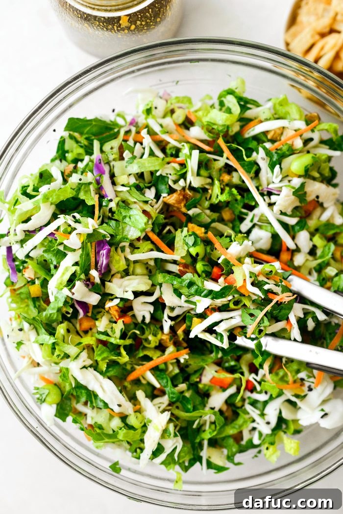 Tropical Teriyaki Salad 9 Tossing the salad ingredients together