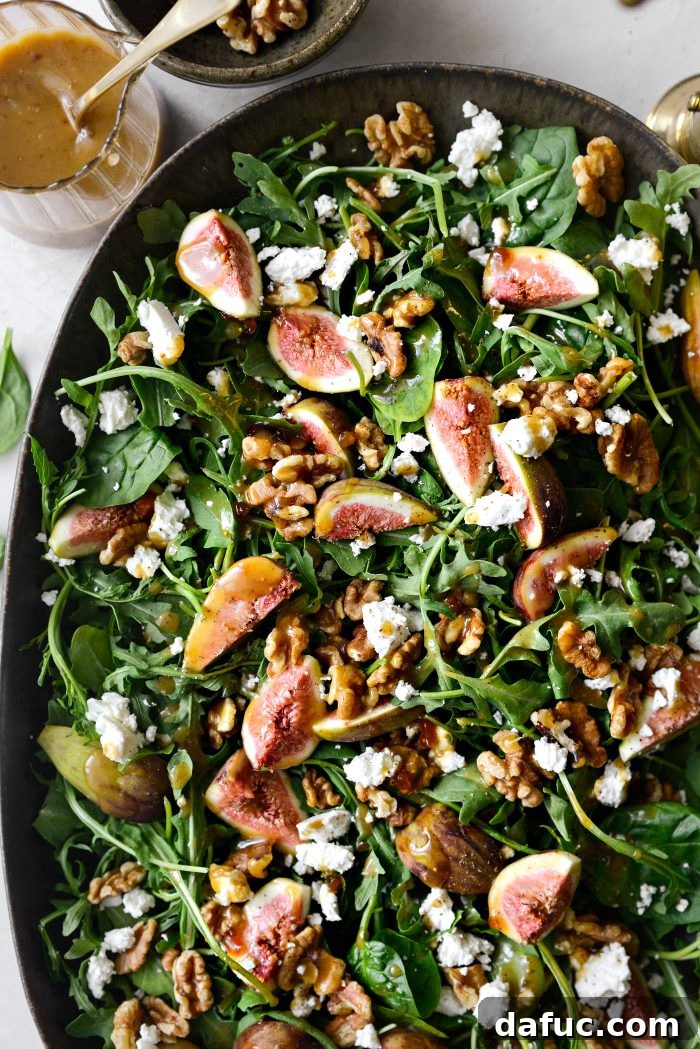 Fresh Fig Salad with Goat Cheese and Walnuts on a serving platter
