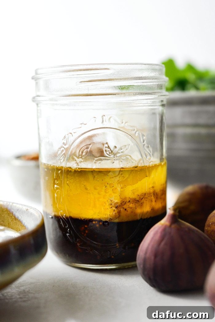 Ingredients for fig balsamic vinaigrette in a glass jar