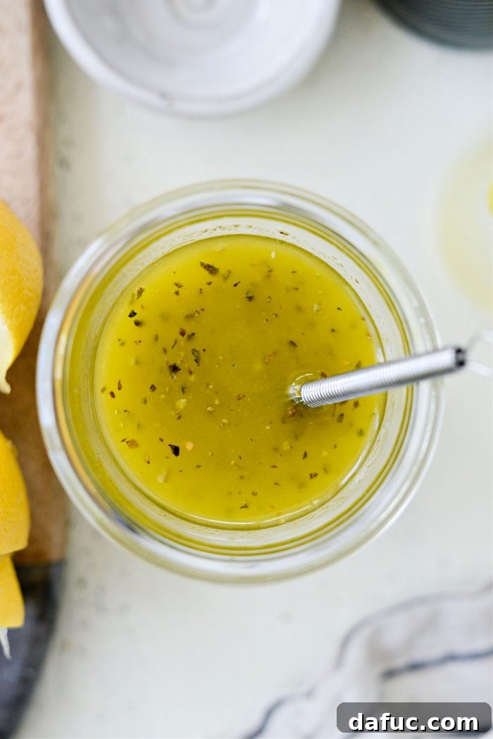 My Grandma's Homemade Greek Dressing in a serving bottle
