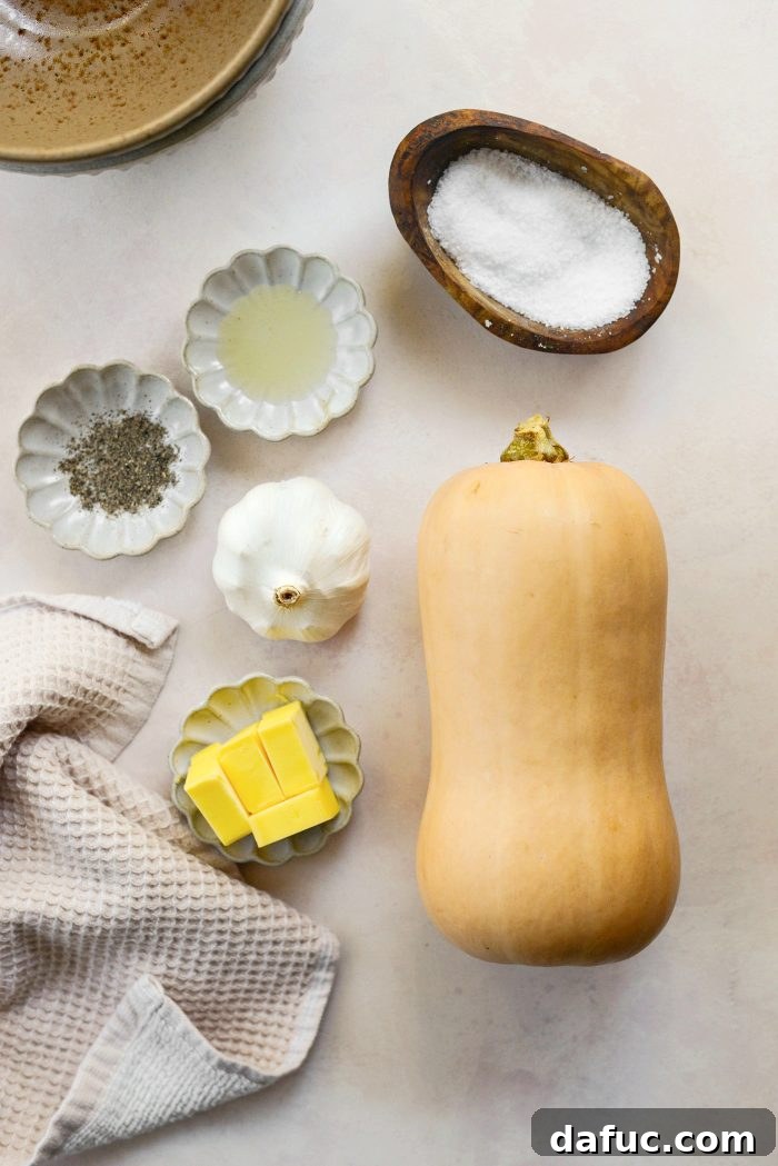 Roasted Garlic Golden Squash Whip 3 Ingredients for Roasted Garlic Whipped Butternut Squash including squash, garlic, olive oil, salt, butter, and pepper