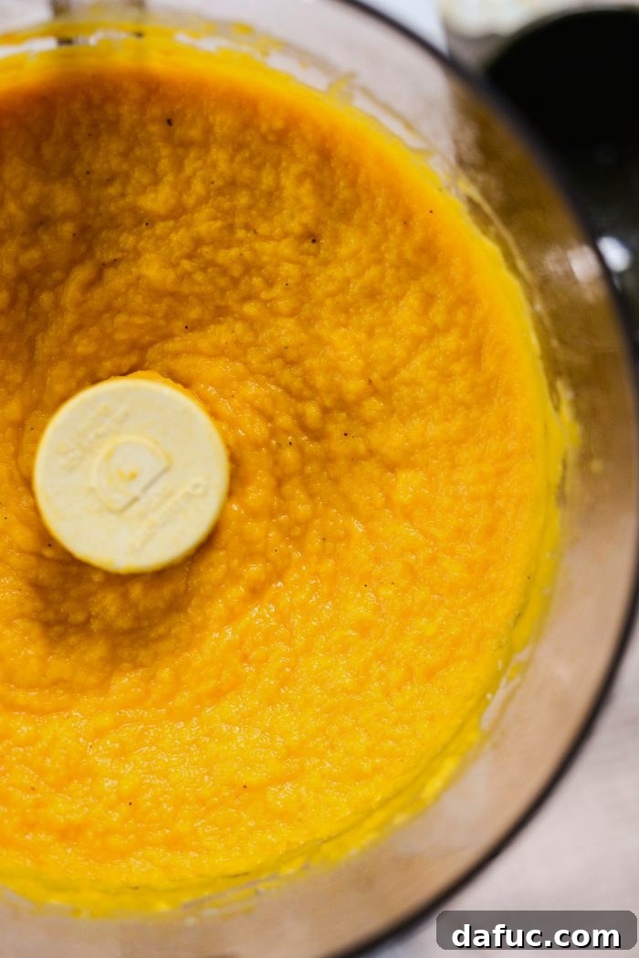 Roasted Garlic Golden Squash Whip 10 Food processor pureeing roasted garlic whipped butternut squash