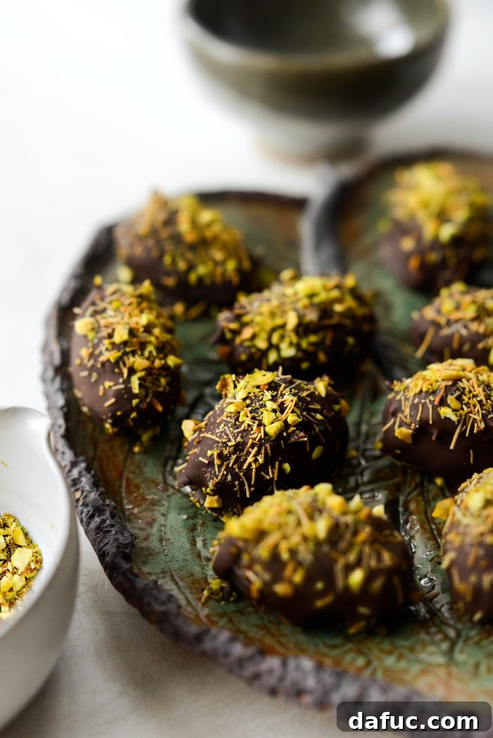 A close-up of a Dubai Stuffed Date highlighting its luxurious texture and appeal