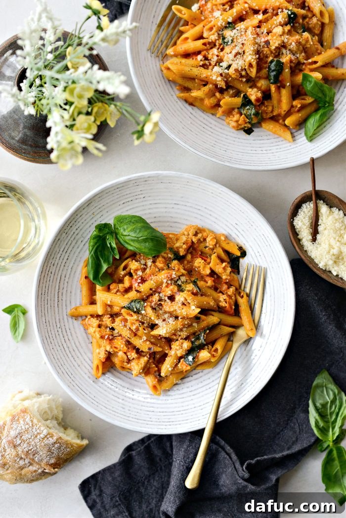 Cheesy Chicken One Pot Pasta served in a bowl