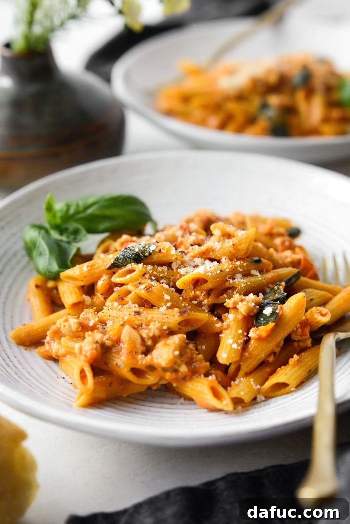 Cheesy Chicken One Pot Pasta in a bowl, ready to serve