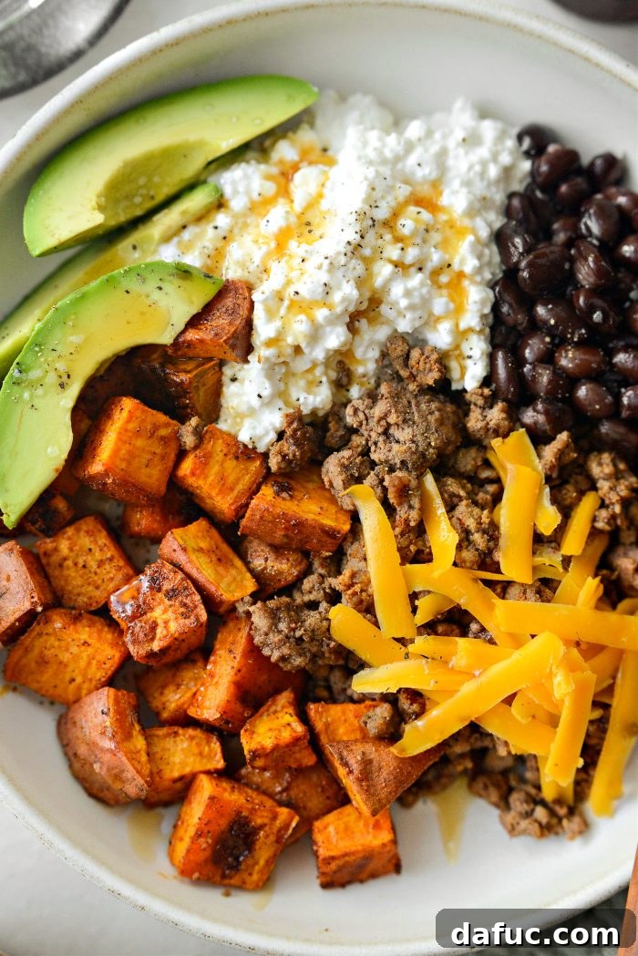 A final close-up shot of a Sweet Potato Beef Bowl with Hot Honey, emphasizing the inviting textures and colors.