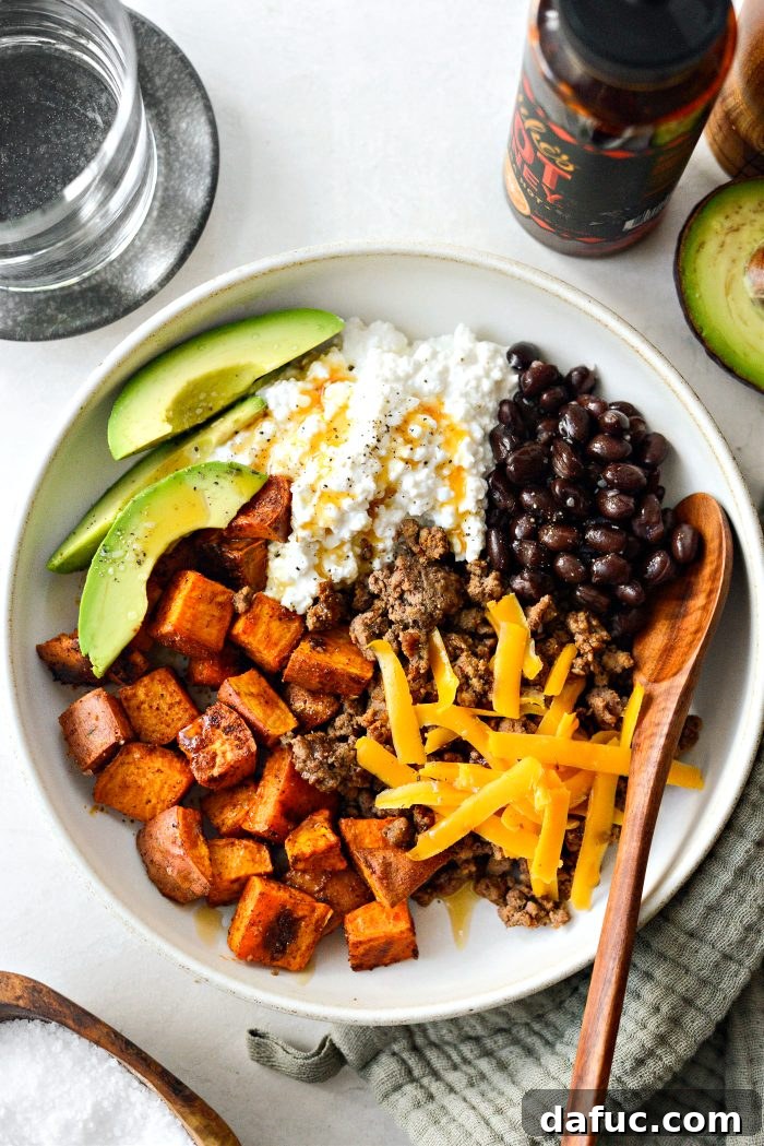 Close-up of a Sweet Potato Beef Bowl with Hot Honey, highlighting the vibrant colors and textures of the ingredients.
