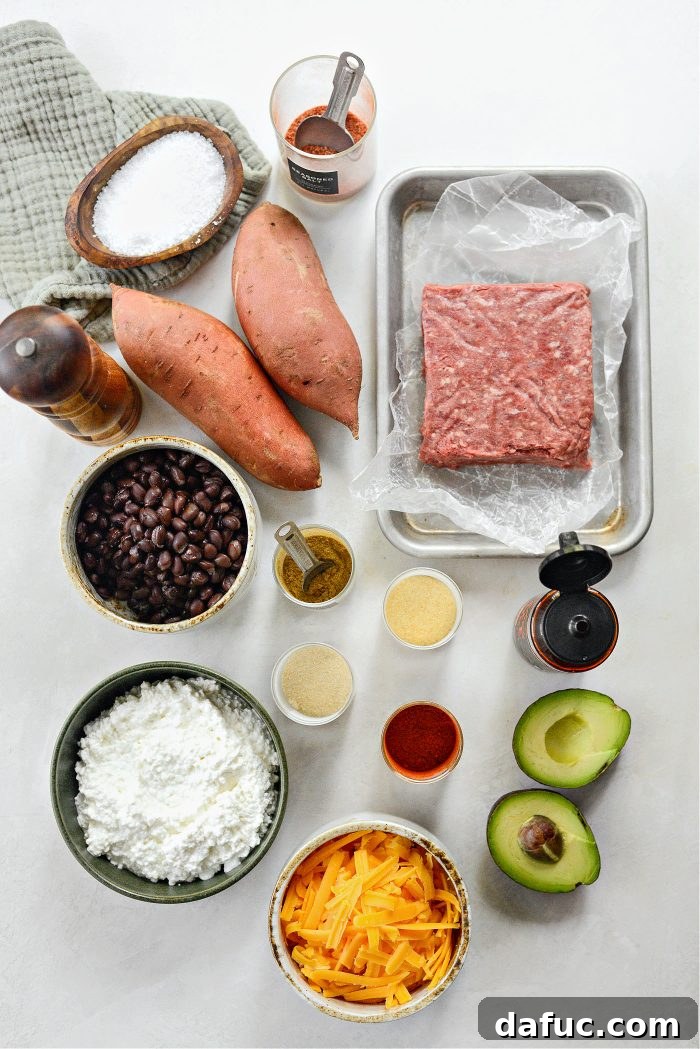 Overhead shot of three Sweet Potato Beef Bowls with Hot Honey, ready for serving or meal prepping.