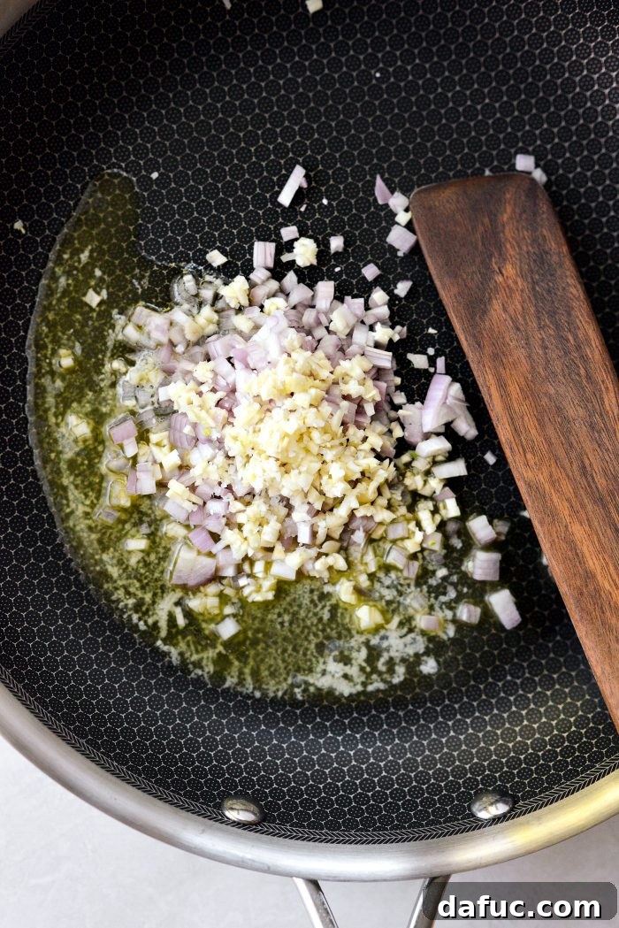 butter, shallot and garlic in skillet