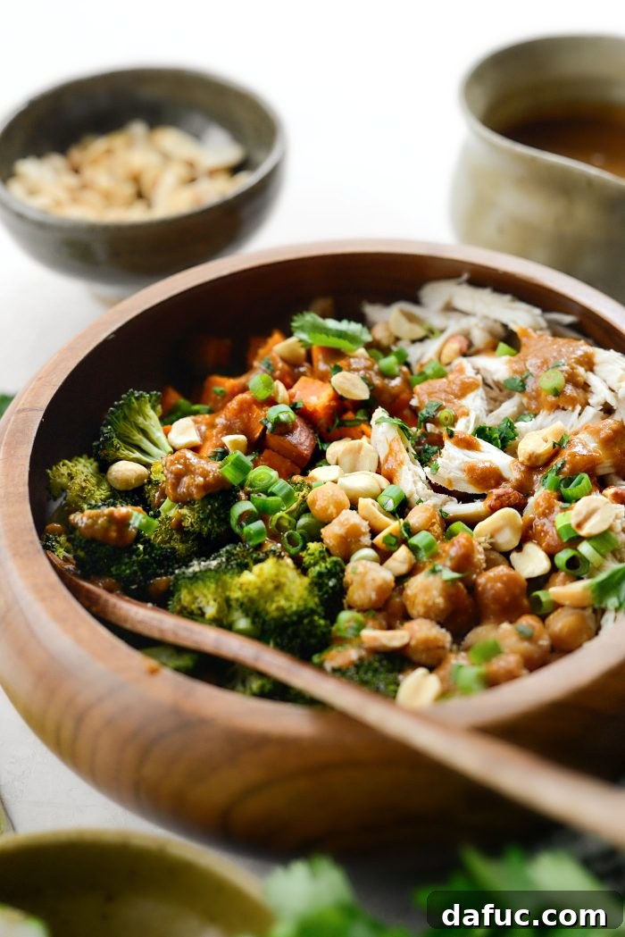 Close-up of Peanut Chicken Sweet Potato and Broccoli Bowls