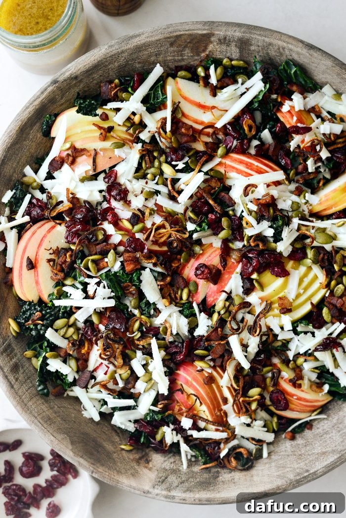 Honeycrisp Apple and Crispy Pancetta Kale Salad with Manchego 15 top with manchego, pancetta, crispy shallots, dried cranberries and pepitas