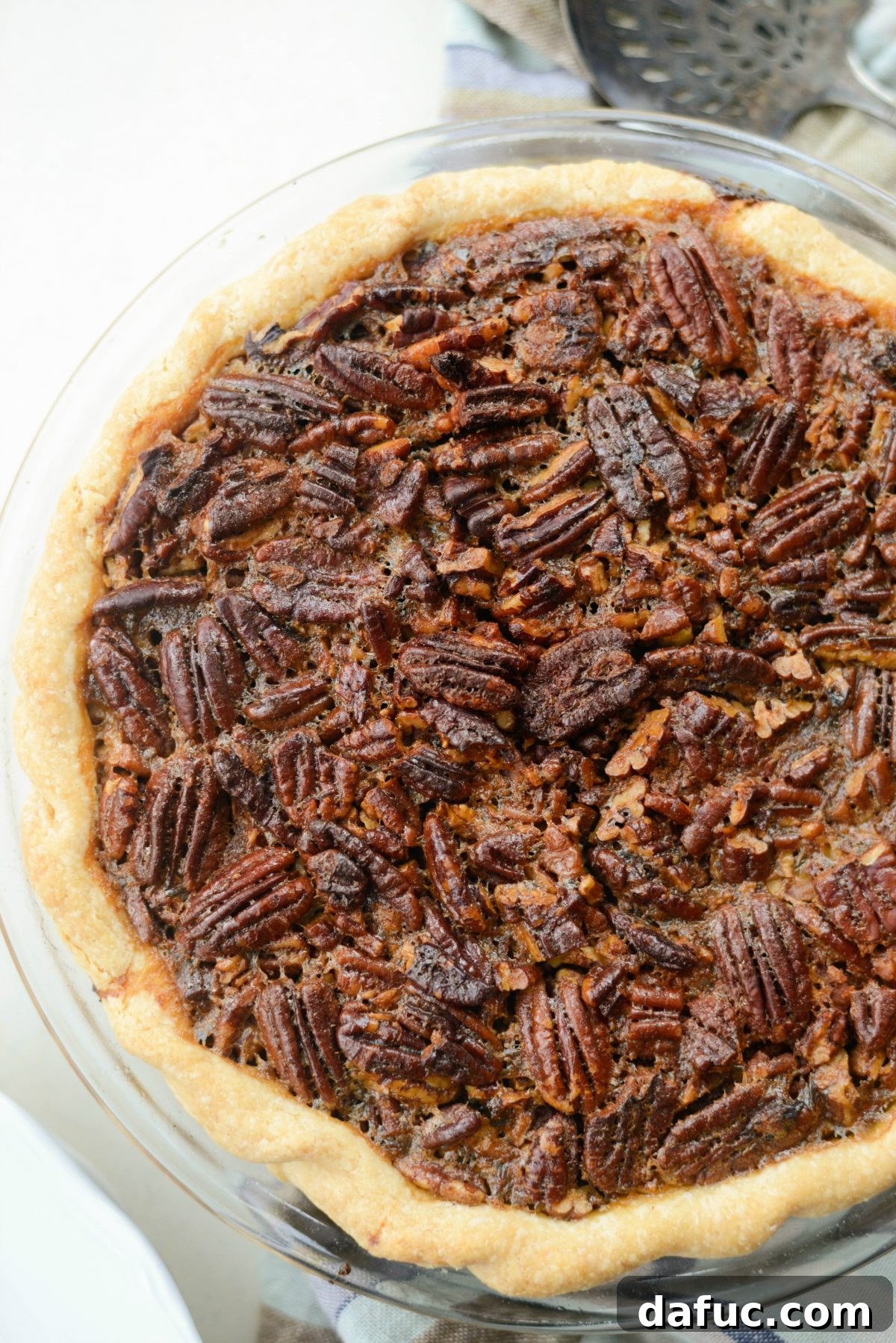 Irresistible Classic Pecan Pie 18 Best Pecan Pie Recipe slice on a plate, ready to serve.