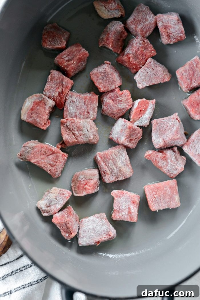 Guinness-Infused Irish Beef Stew 11 Searing beef in batches in a hot pan