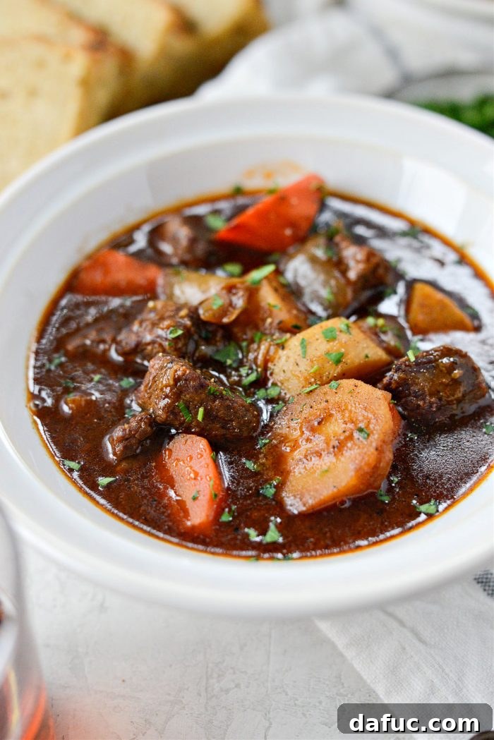 Guinness-Infused Irish Beef Stew 3 Close-up of a rustic bowl of Irish Stout Beef Stew