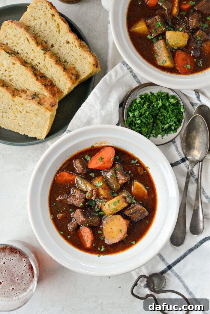 Guinness-Infused Irish Beef Stew 28 Bowl of finished Irish Stout Beef Stew, garnished with fresh parsley