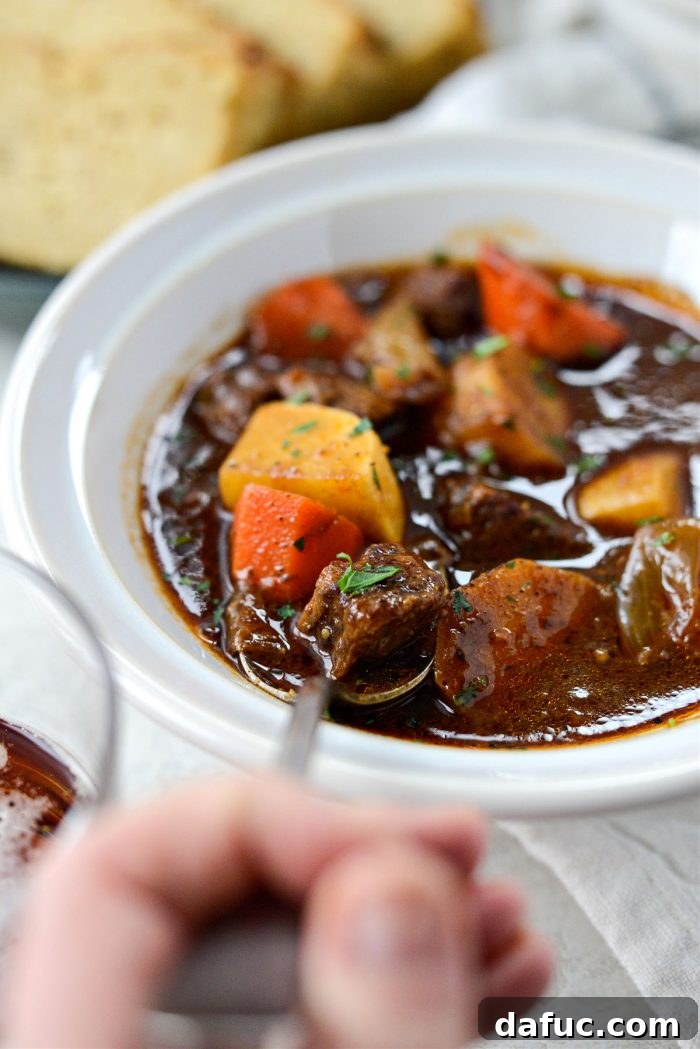 Guinness-Infused Irish Beef Stew 30 Close-up of a bowl of Irish Stout Beef Stew, ready to be enjoyed