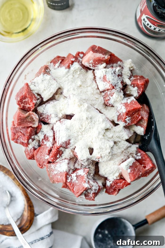 Guinness-Infused Irish Beef Stew 8 Tossing beef with flour for a light coating