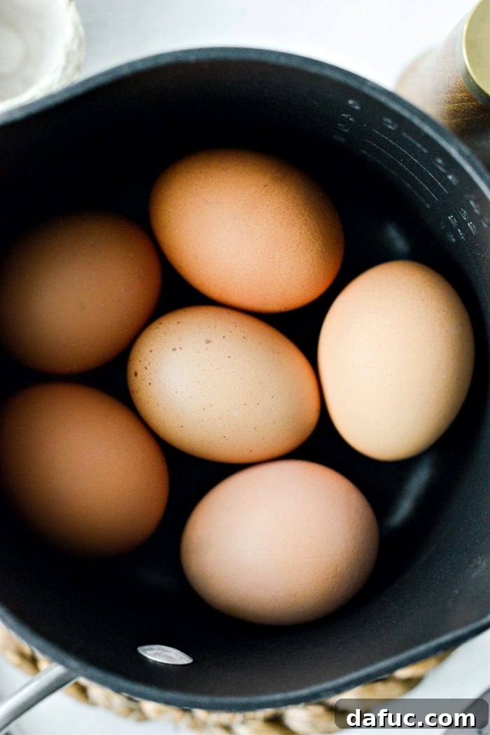 Flawless Hard Boiled Eggs Every Time 4 eggs in saucepan