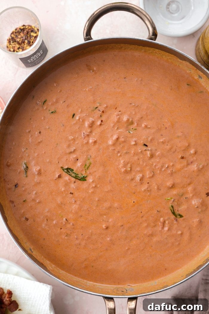 Creamy Blush Pasta 19 Creamy pink sauce simmering in the skillet