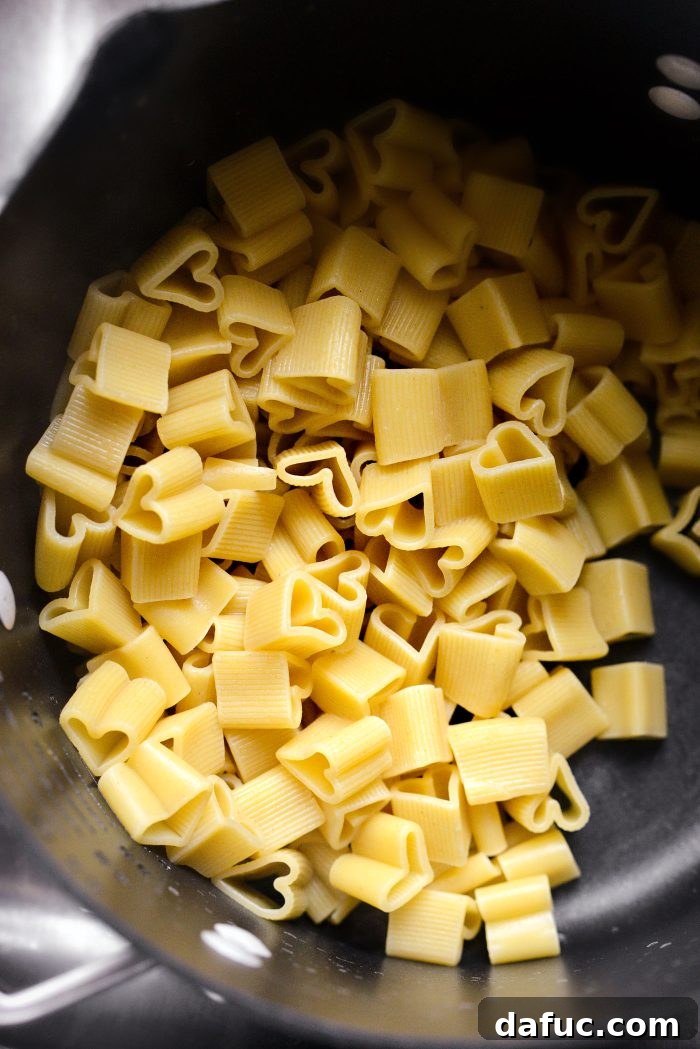 Creamy Blush Pasta 20 Reserving pasta water before draining cooked pasta