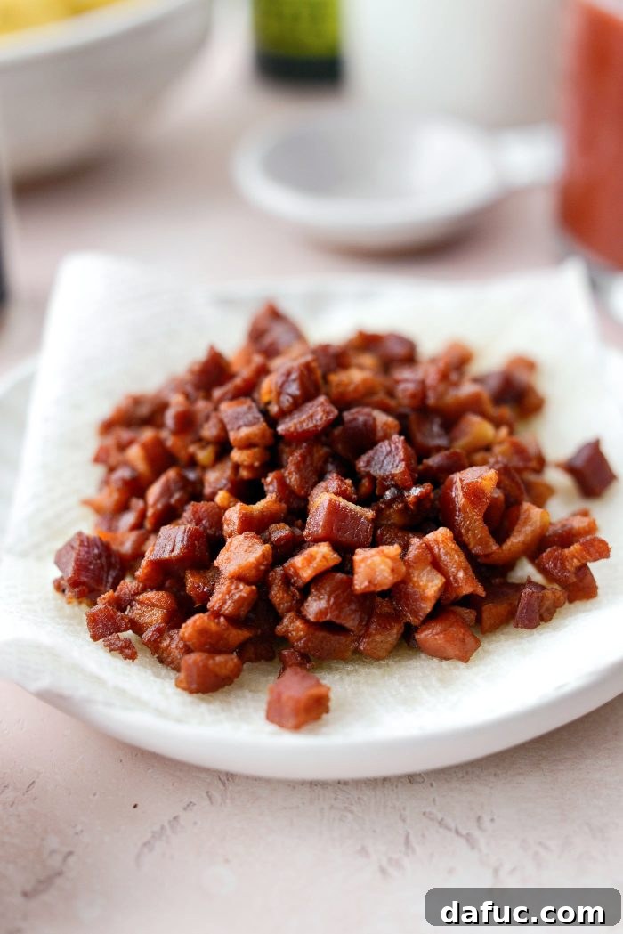 Creamy Blush Pasta 8 Transferring crispy pancetta to a paper towel lined plate