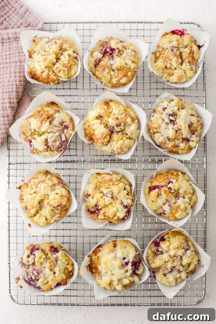 Transferring warm muffins to a wire rack for cooling