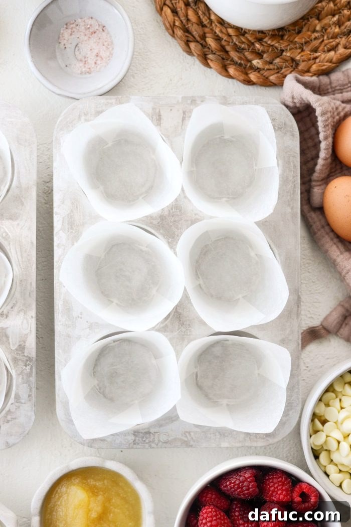 Preheat oven and line a muffin tin with paper liners