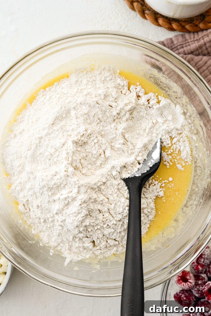 Adding dry ingredients to the wet mixture