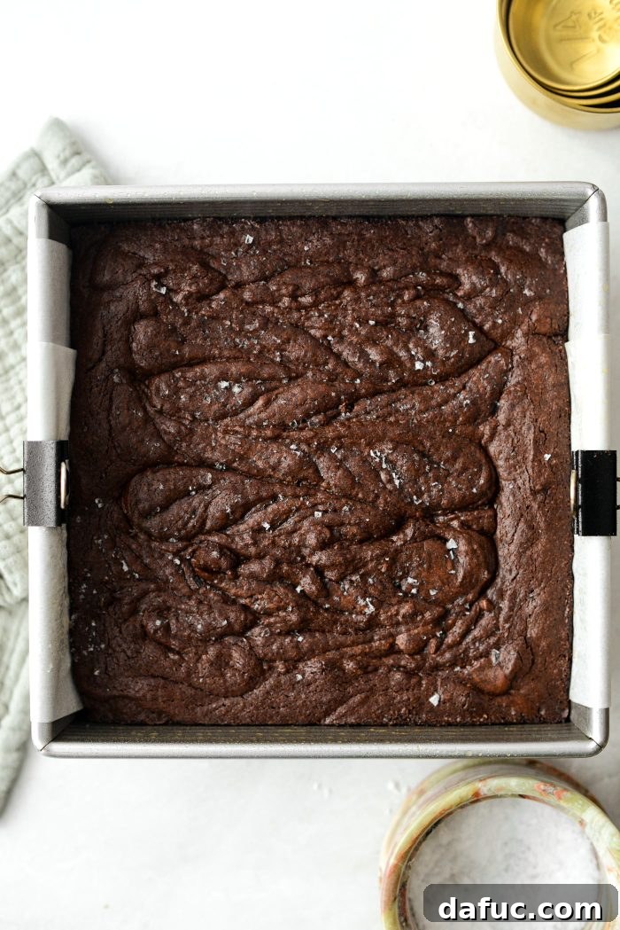 Freshly baked Salted Fudge Brownies cooling in the baking pan