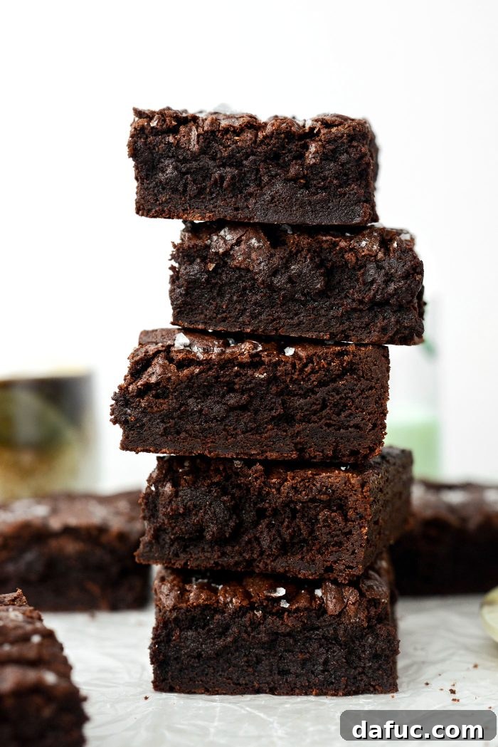 Close-up of baked Salted Fudge Brownies, showing the flaky sea salt on top