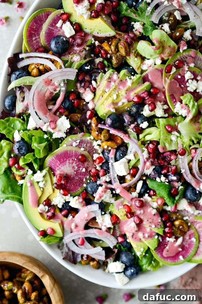 Close-up of the fresh Blueberry Pistachio Spring Salad components before dressing.