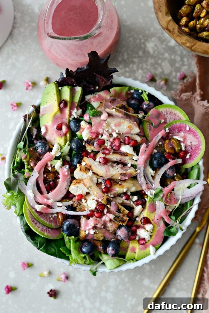 A beautifully composed individual serving of Blueberry Pistachio Spring Salad.