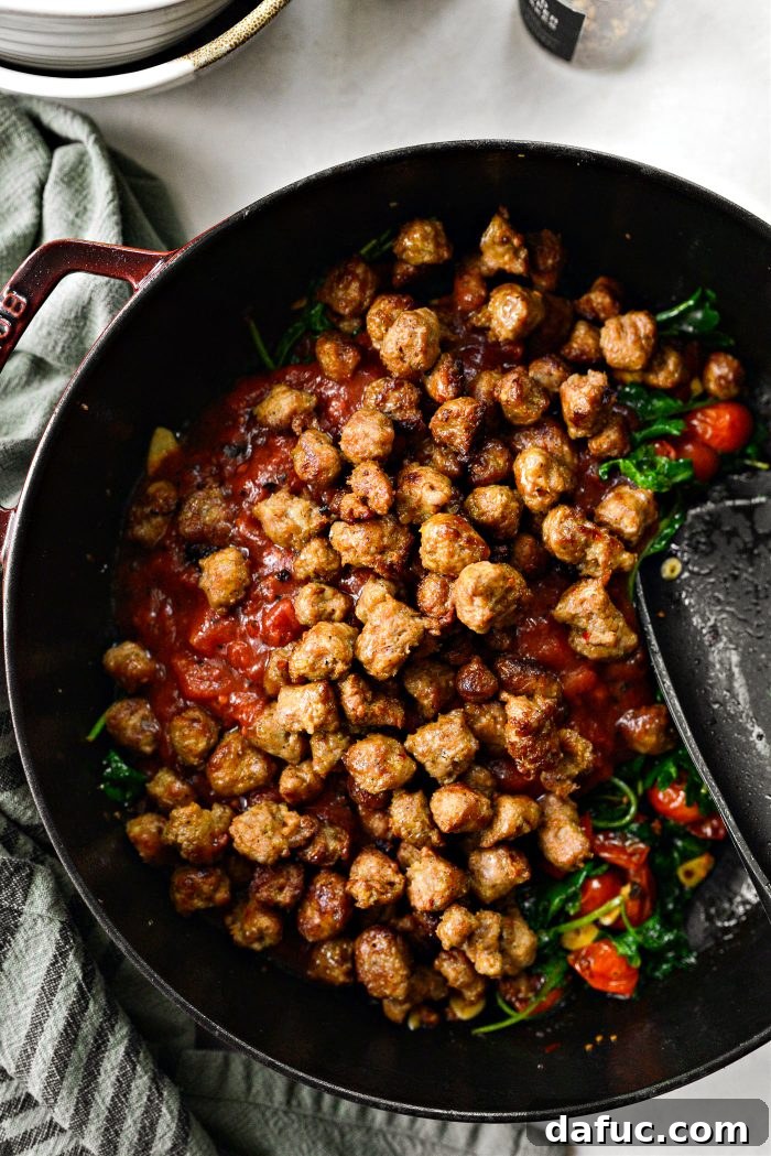 Hearty Sausage and Kale Pasta with Burst Tomatoes 11 Pour in fire-roasted tomatoes and add browned Italian sausage back into the skillet to simmer and thicken the sauce.