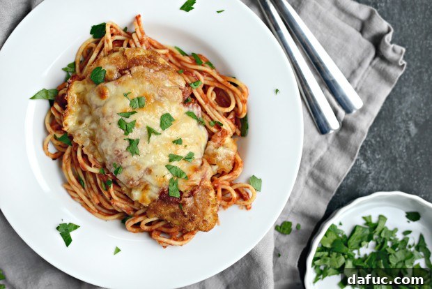 Crispy Easy Chicken Parmesan with melted cheese