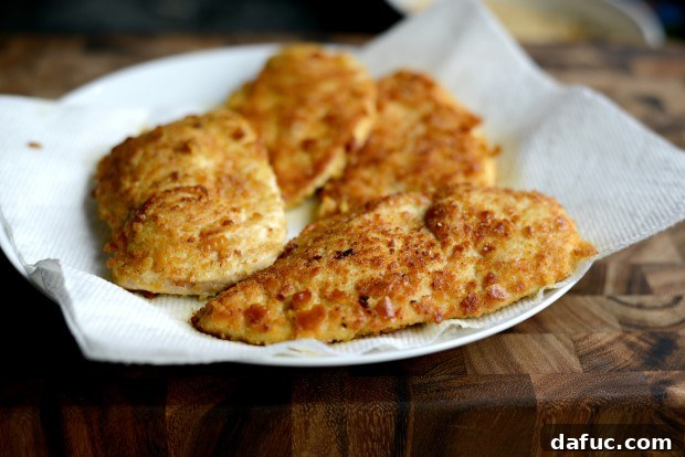 Golden-brown chicken breasts after pan-frying