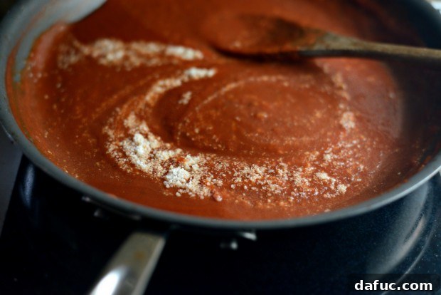 Marinara sauce simmering with butter